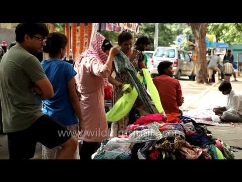 Women hunting out for best scarves in Delhi