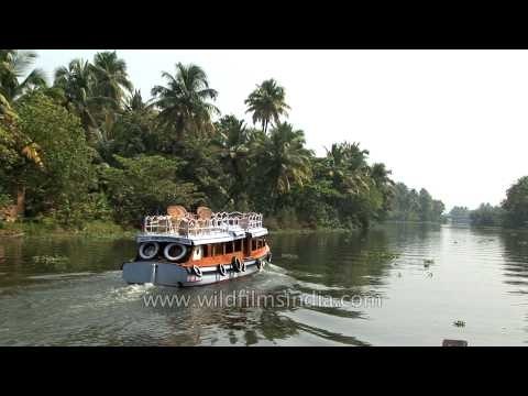 Kerala house boat gliding along the backwaters