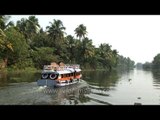 Kerala house boat gliding along the backwaters