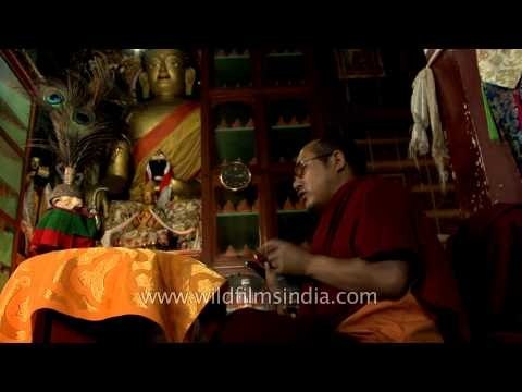 Buddhist monk offering prayers at Sarnath in Varanasi