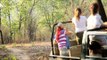 Tourists watch a tiger during Jeep safari in Bandhavgarh national park
