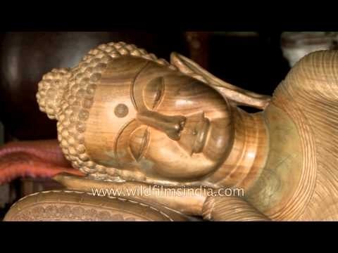 Large statue of reclining Buddha inside Buddhist Monastery, Sarnath