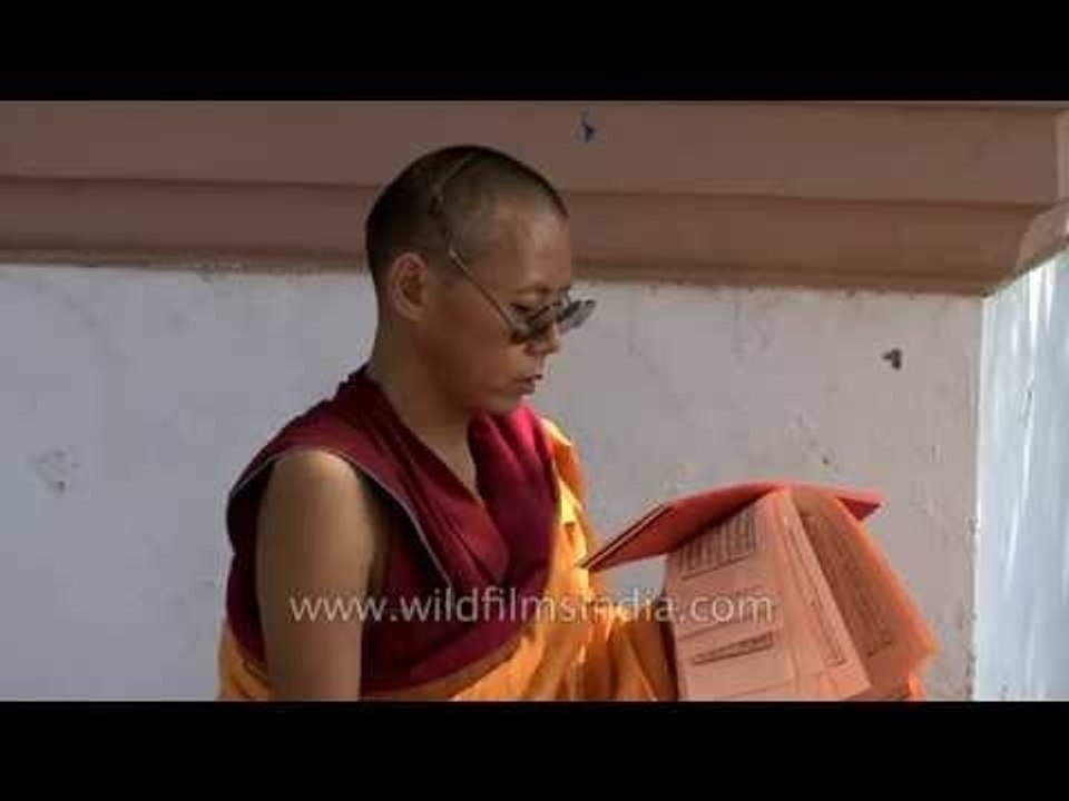 Buddhist monk reciting spiritual hymns