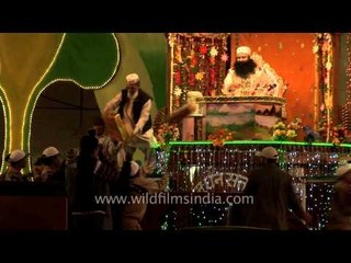 Baba Ram Rahim distributing gifts on the occasion of his birthday