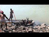 Burning of a dead body on the ghats of Ganga river