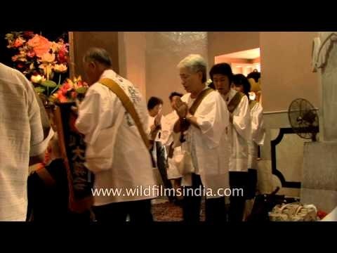 Devotees inside the Mulagandhakuti Vihara Temple at Sarnath