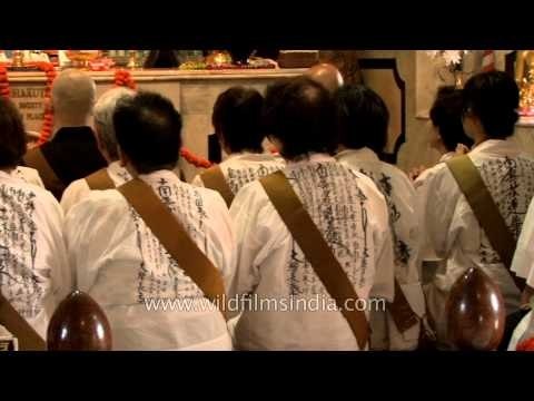Devotees worship the statue of Gautam Buddha - Mulagandhakuti Vihara, Sarnath