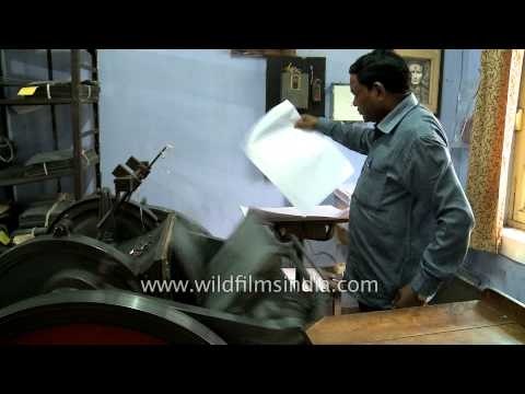 Printing of braille books in manual printing press - Central Braille press