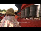 Spinning prayer wheels at Mindrolling Monastery, Dehradun