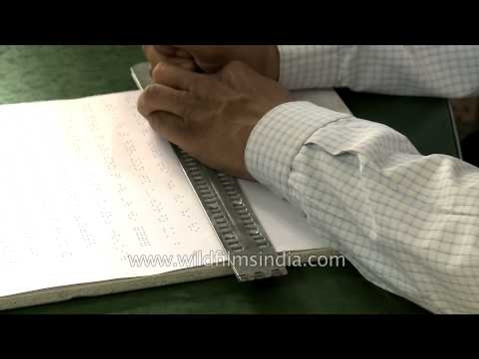 Writing braille with the slate and stylus