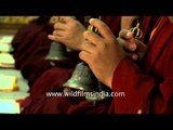 Buddhist monks offer prayer at Padmasambhava shrine, Mindrolling Monastery