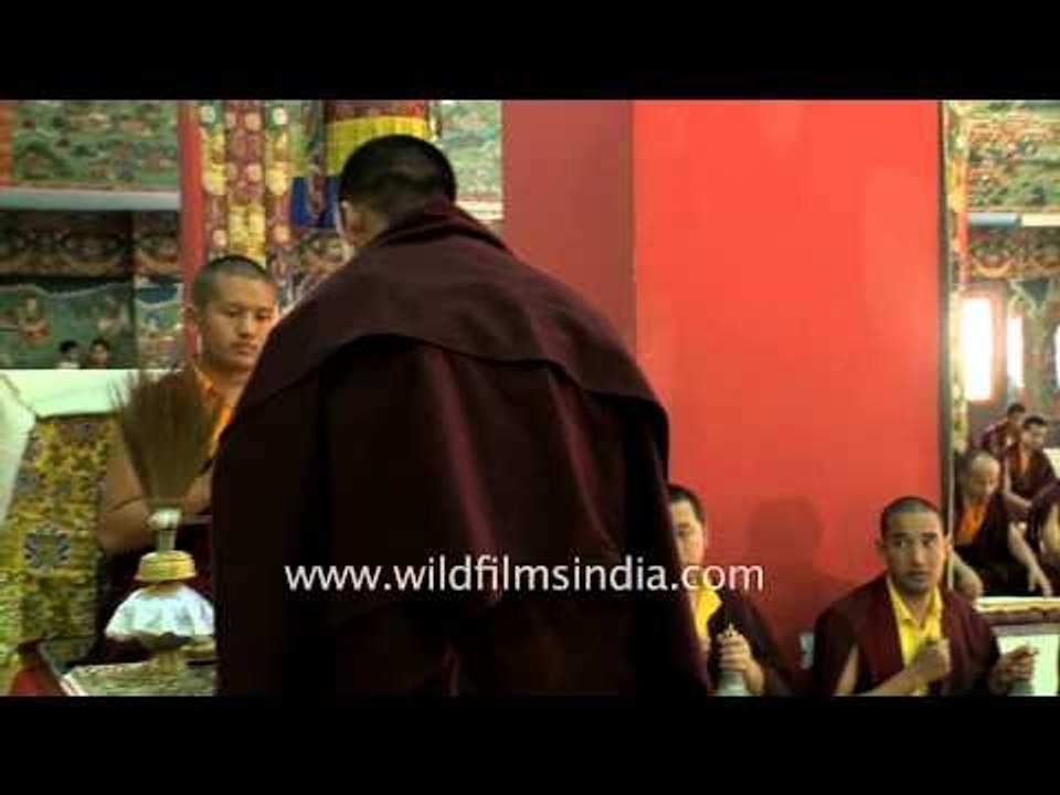 Buddhist monks reading holy scriptures at Mindrolling Monastery