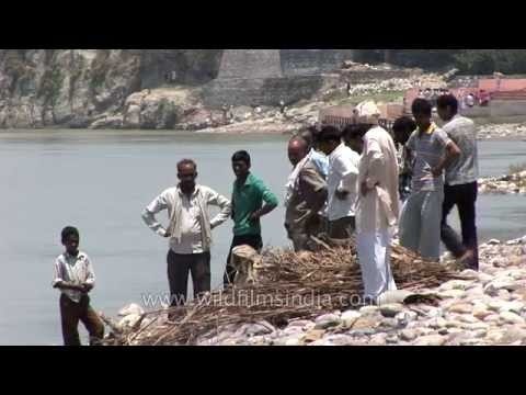 Hindus cremate their dead, by the Ganges