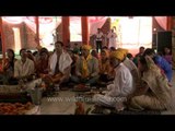 Devotees performing havan for the 'Pran pratishta' of Sai baba's idol