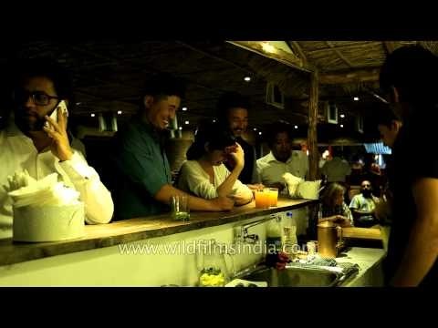 Visitors ordering hard drinks at Dzukou tribal kitchen, Delhi