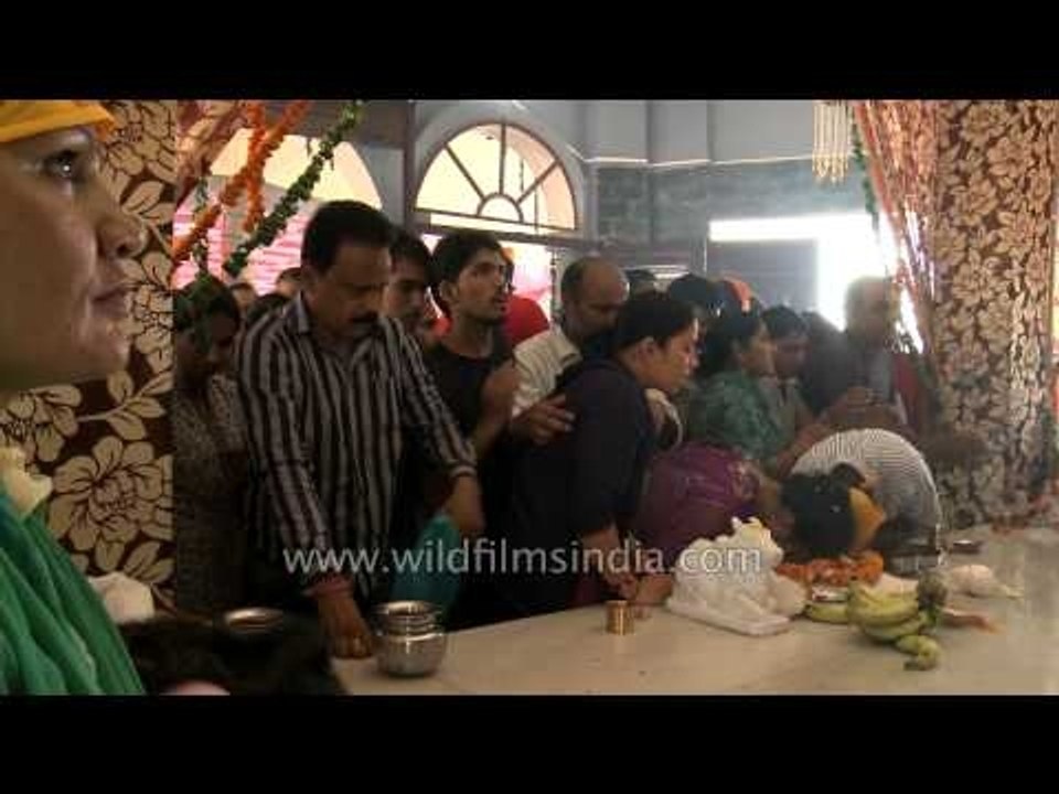 Devotees taking blessings from Sai Baba in Saisthanam temple