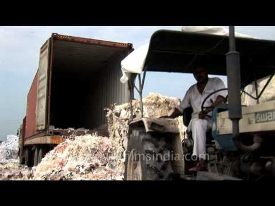 Imported paper waste from European countries at recycling yard