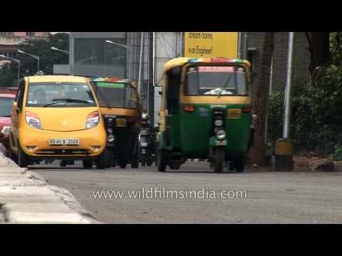 Busy traffic in Bangalore city - Tata Nano battles auto rickshaws