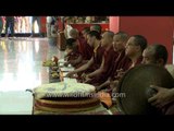Buddhist monks offer prayer at Og Min Ogyen Mindroling Monastery