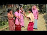 Manipuri women in colourful phanek dancing on camera