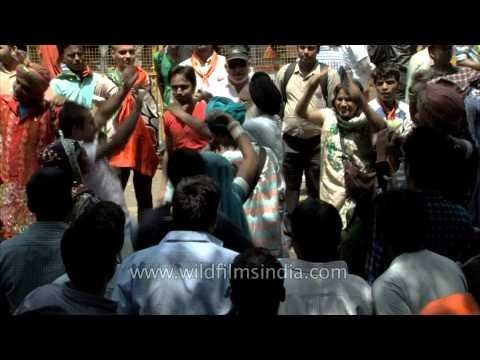BJP supporters in Delhi celebrate the party's victory