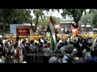 BJP activists celebrate the victory of the party outside its office
