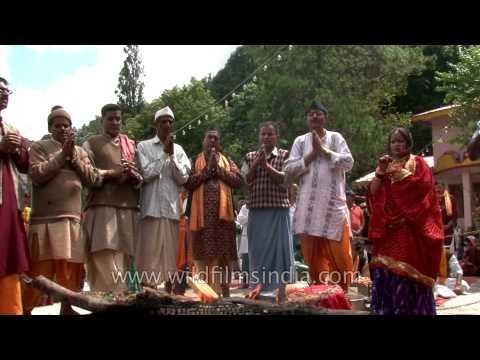 Devotees offering prayer after havan rituals