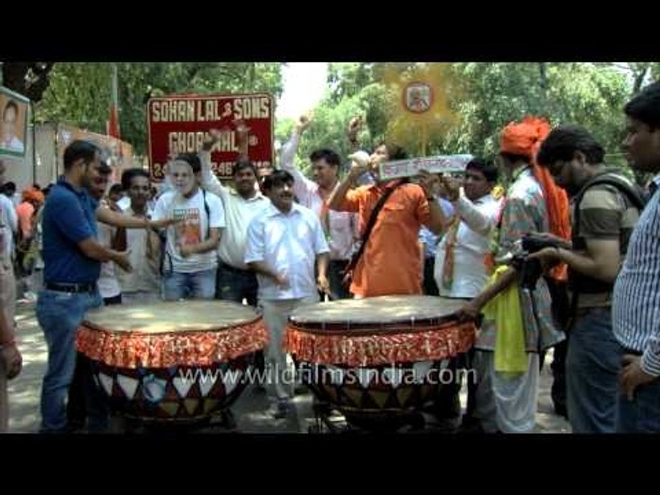 BJP supporters celebrate the election results o...