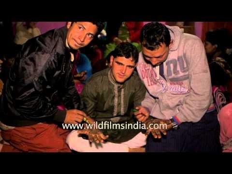 Groom's relatives applying 'henna' on his palm : Kumaoni wedding