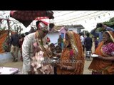 Groom's mother performing rituals of 'baraat' ceremony : Kumaoni wedding