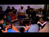 People singing devotional songs during a 'Kumaoni wedding' in Uttarakhand