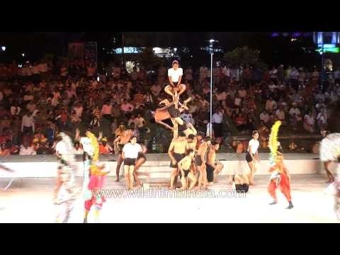 Mallakhamb team showcasing their strength and flexibility