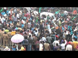 100 meter long patakha ladhi as devotees carry doddesses Nanda and Sunanda in palanquin