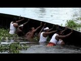 Traditional snake boat overturned at  Punnamada Backwater, Kerala