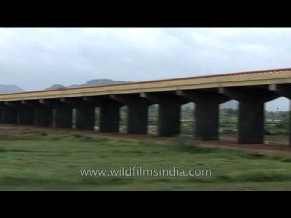 Crossing a bridge during  a train journey to Kerala