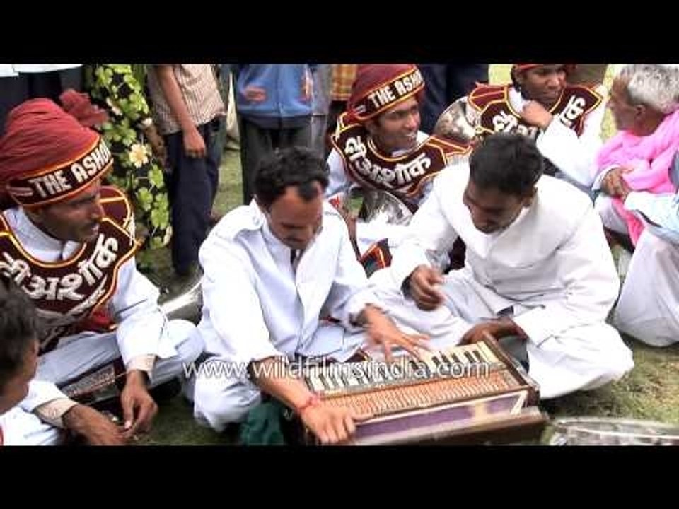 Local musicians performing in open space during Holi Festival, Jaipur