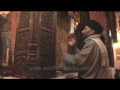 Devotees offering prayers Makhdoom Sahib Shrine