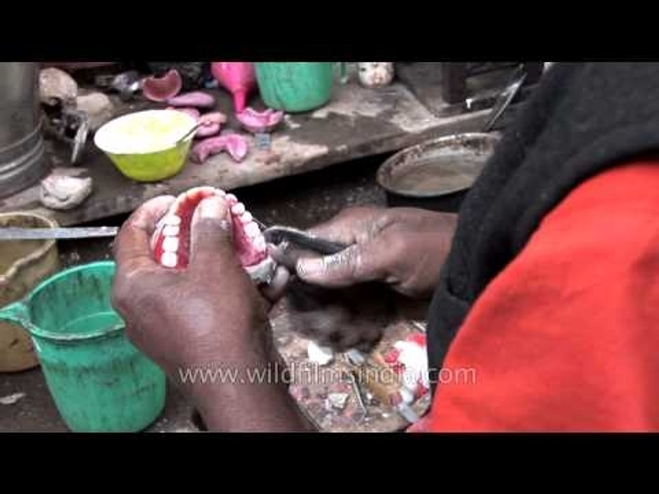 Roadside dentist of Varanasi making denture