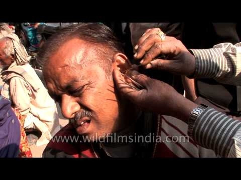 Roadside ear wax cleaning in India