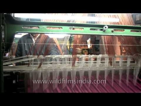 Artisans weaving magical patterns into the Banarasi silk saree