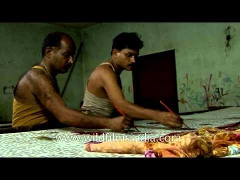 Artisans painting motifs on a Banarasi silk saree - Varanasi