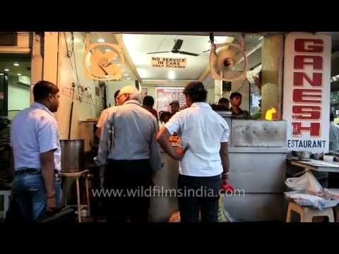 Hungry commuters clamour for quick dinner at a local street kitchen
