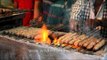 Succulent Indian lamb kebabs spit and sizzle over an open fire