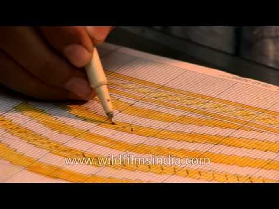 Artisans crafting beautiful designs for Banarasi Sarees