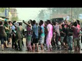 Manipuri youth dancing on the streets of Imphal during Holi