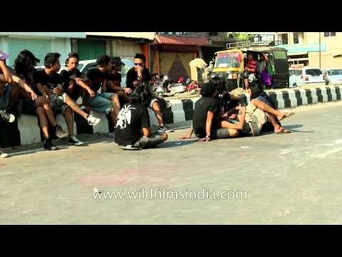 Youngsters of Manipur sit and relax on the streets of Imphal