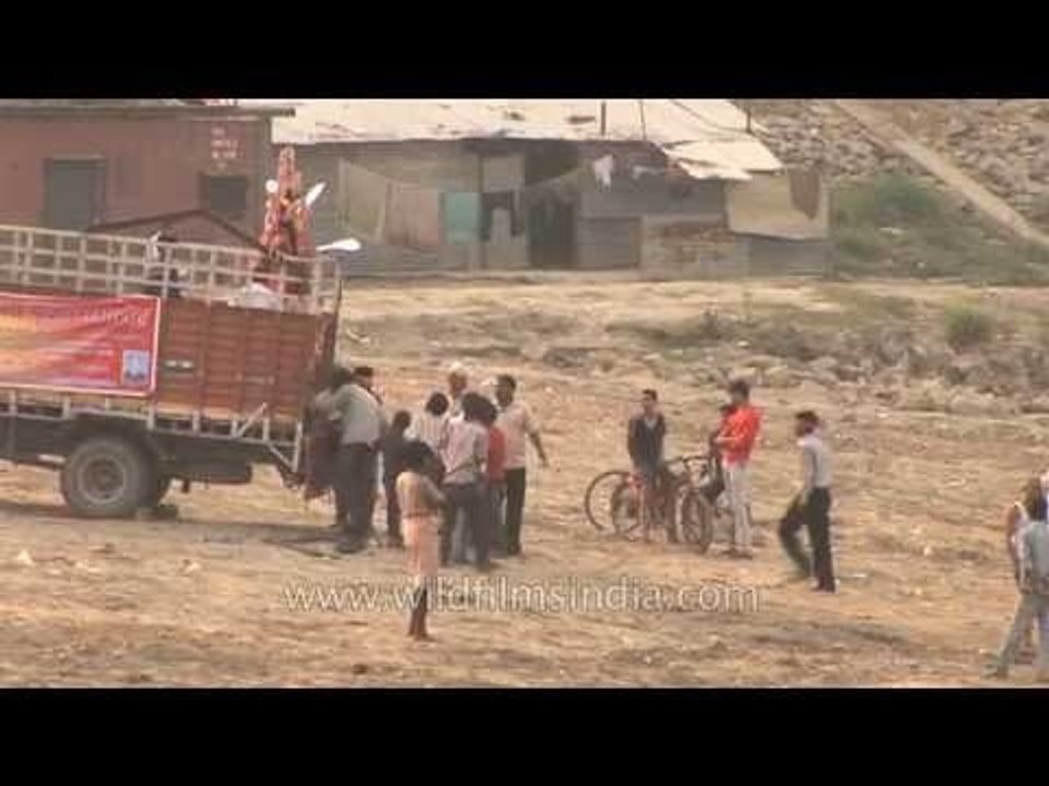Durga Puja idol immersion at banks of Yamuna River in Delhi