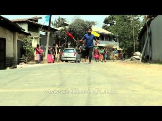 Manipuri mothers taking part in pot race competition