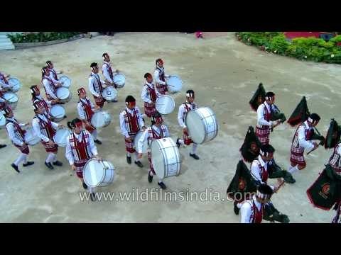 Perfect synchronization of footfalls and drum beats during a march by Mizo Pipers