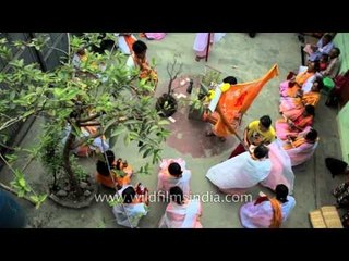Manipuri women sing in praise of holy consort Radha-Krishna